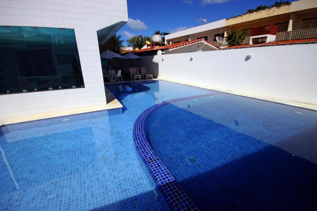 Flat No Hotel Carneiro De Tamandare ปรายา ดอส การ์เนย์รอส ภายนอก รูปภาพ